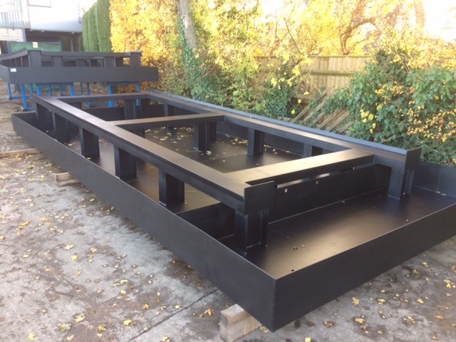 Custom fabricated drip trays for recycling company